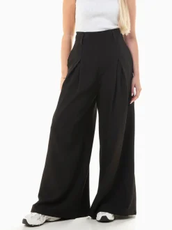 Calças elegantes wide leg com pinças