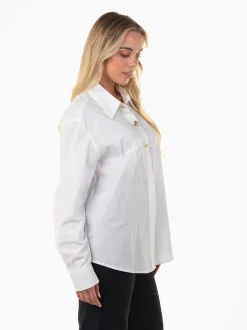 Camisa com botões dourados