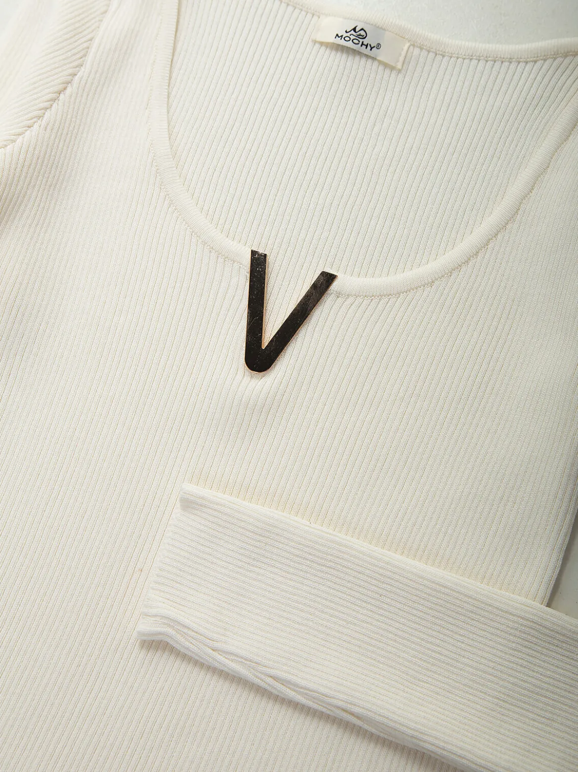 Camisola malha com detalhe dourado