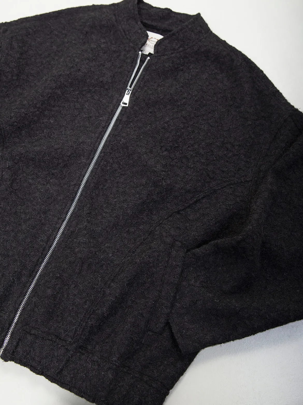 Casaco oversized efeito bouclé