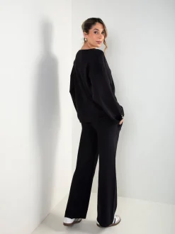 Conjunto malha preto camisola e calças