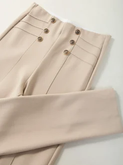 Leggings cintura alta botões dourados