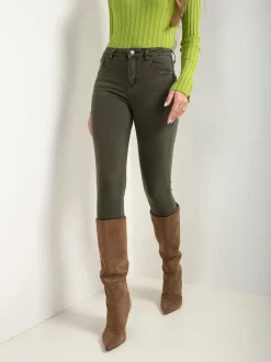 Skinny jeans cintura alta