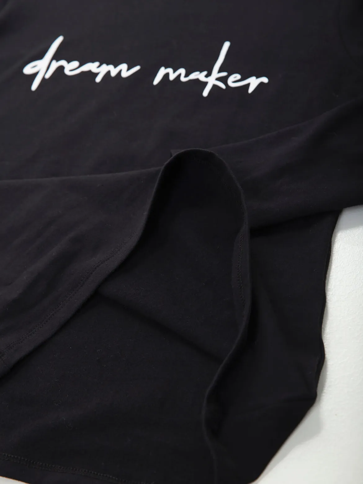T-shirt manga comprida com mensagem